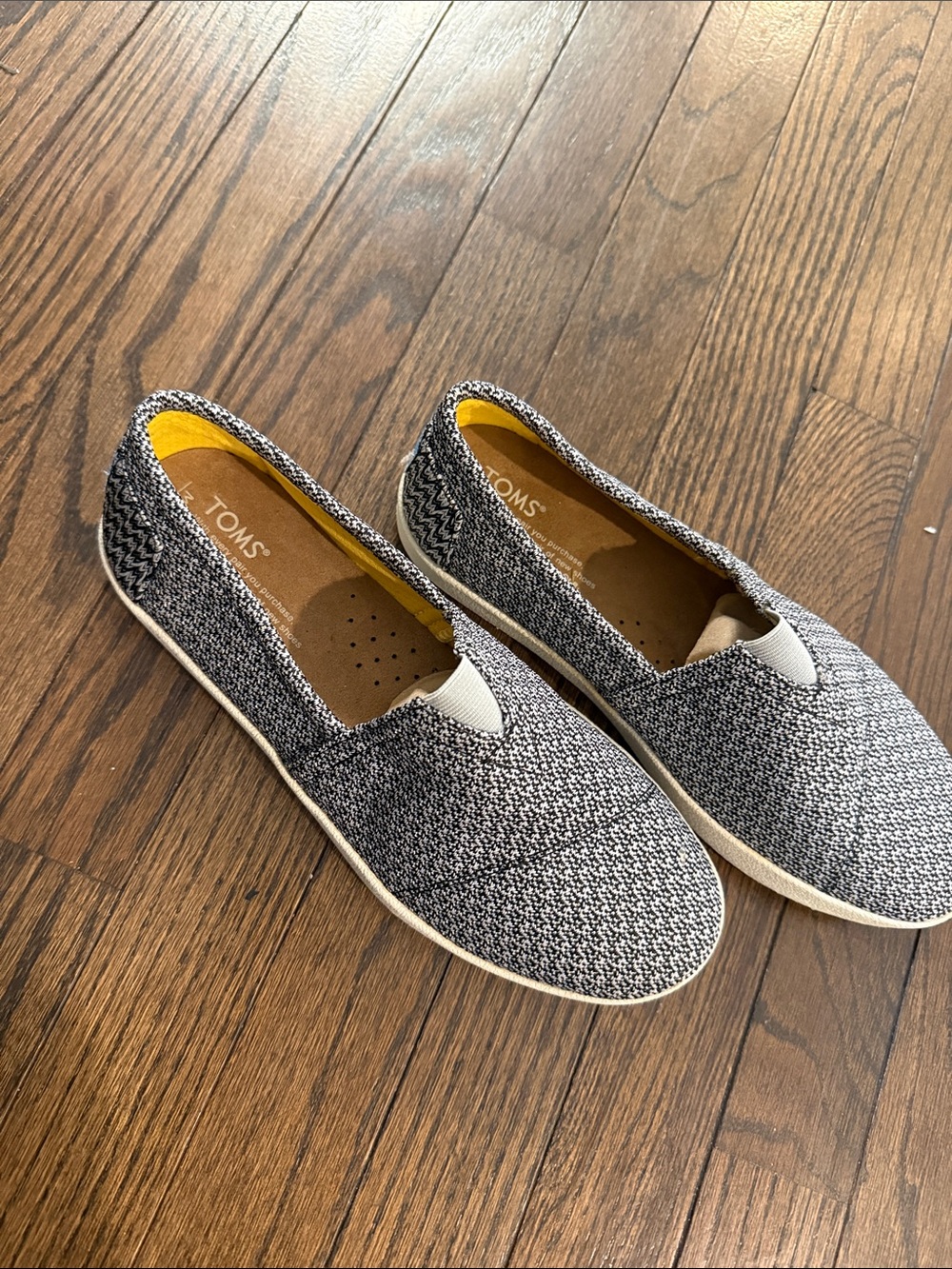 TOMS Black and White Knit Slip-On Shoes with Yellow Insole